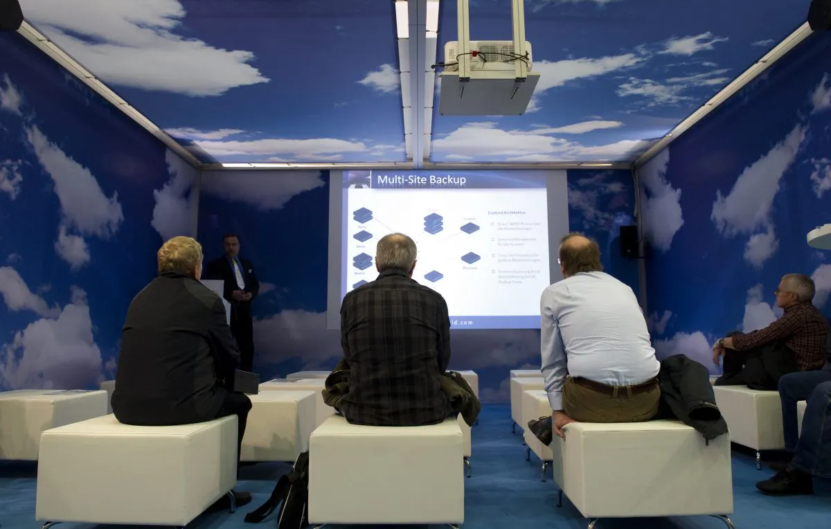 Visitors listen to a speech about "Cloud computing" and backups at the CeBIT, the world's biggest IT fair, on March 3, 2011 in Hanover, central Germany. (Johannes Eisele/AFP/Getty Images)