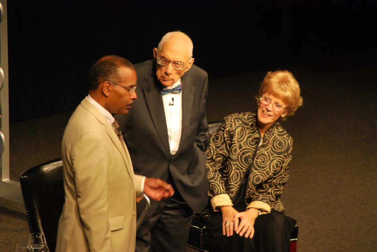 Simeon Booker (Center), joined by his wife, shares what it was like to be a journalist during the Civil Rights movement in the early 1960s with Joe Madison, Sirius XM satellite radio host and civil and human rights activist, at the Newseum in Washington, D.C., on Aug. 22, 2013. (Ron Dory/Epoch Times)