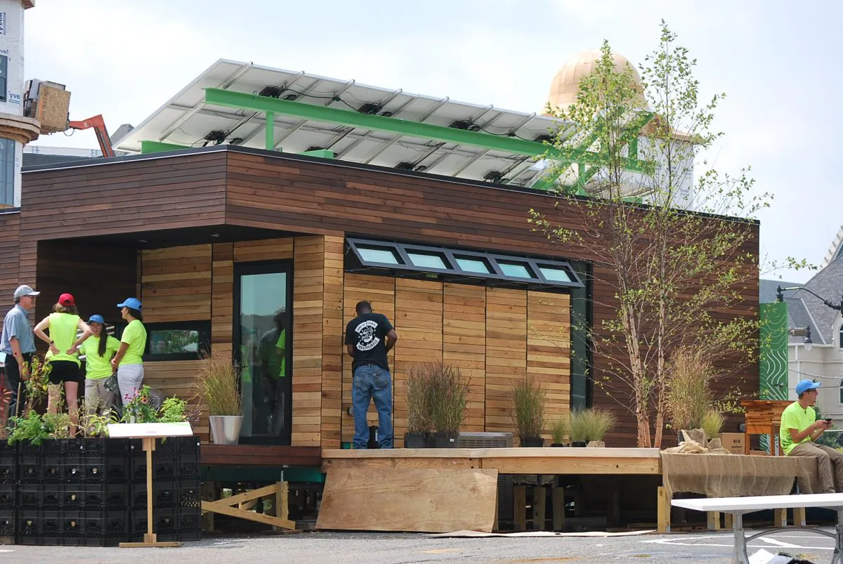 The Harvest Home, solar powered and designed around the theme of the "harvest" was completed by American University, Catholic University, and George Washington University students. The home will compete in the Department of Energy Solar Decathlon in Irvine, Calif., on Oct. 3-13, 2013. (Ron Dory, The Epoch Times)