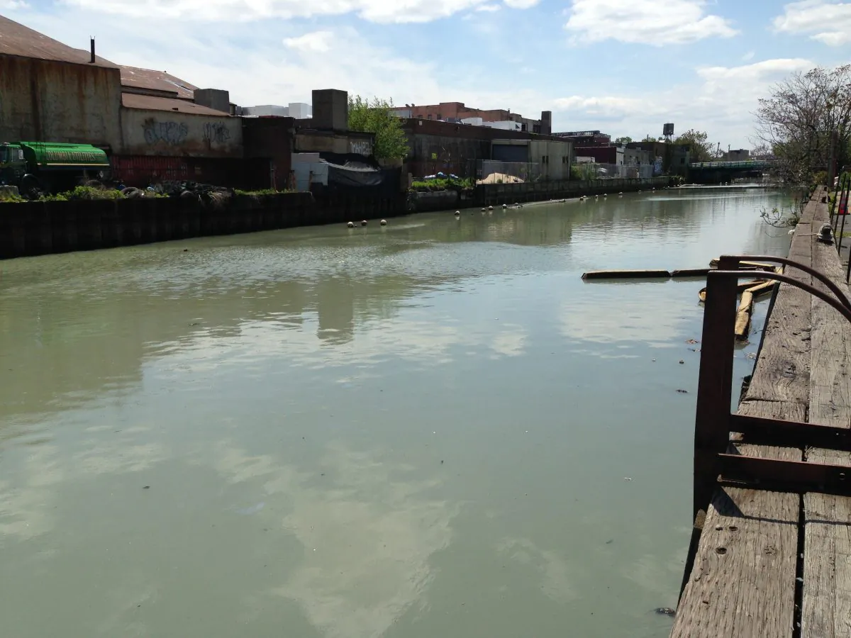 The Gowanus Canal, nearby a waste-water pump, May 2013. New York city council members and the Department of Environmental Protection (DEP) are planning on building a "sponge park," designed to capture storm water that flows from 2nd Street to the Gowanus Canal in Brooklyn.  The projected completion of the prototype green infrastructure park is the summer of 2015. (Ivan Pentchoukov/Epoch Times)