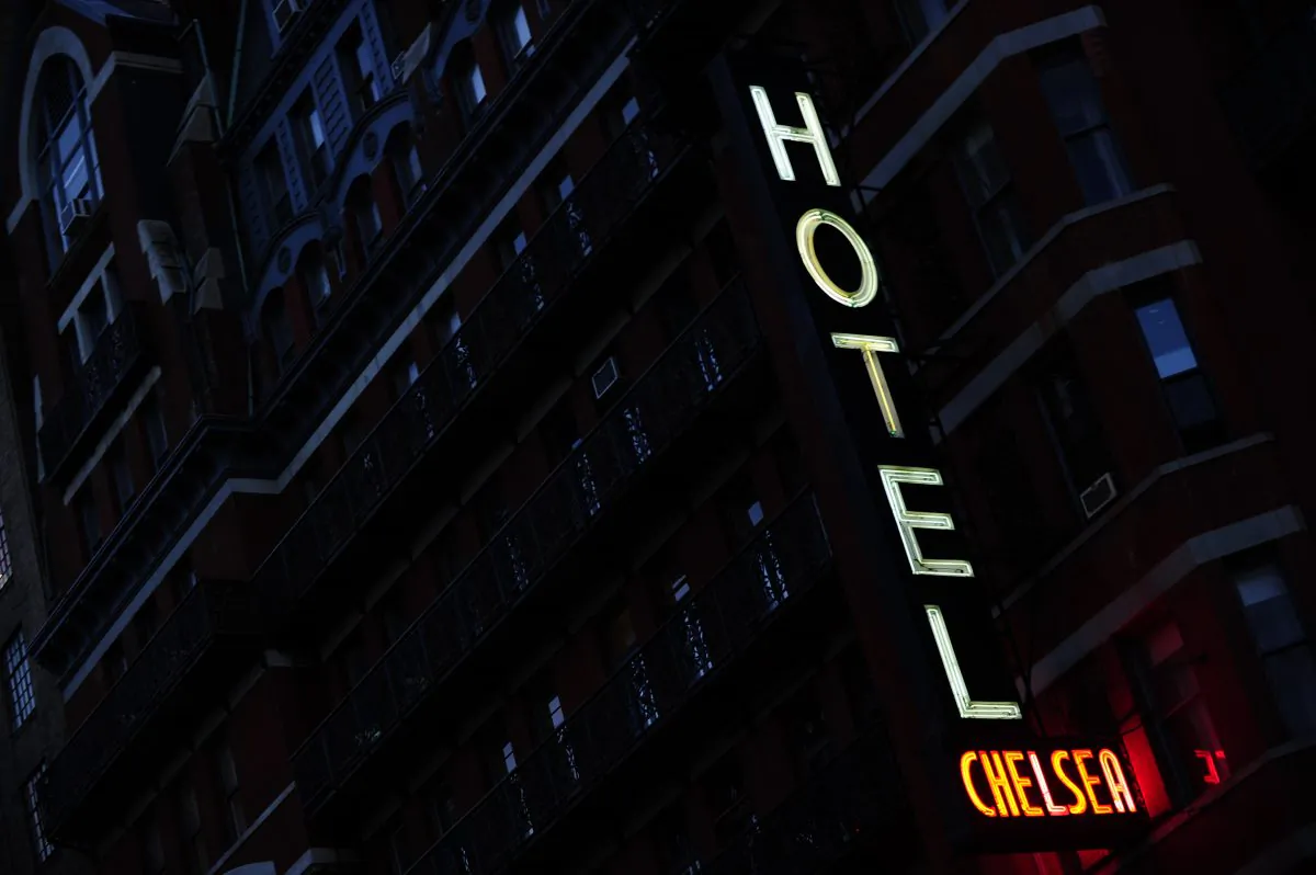 A view of the neon sign adorning the front facade of the Chelsea Hotel in New York. A new analysis of hotel fees found that 2013 will be a record year. (Emmanuel Dunand/AFP/Getty Images)