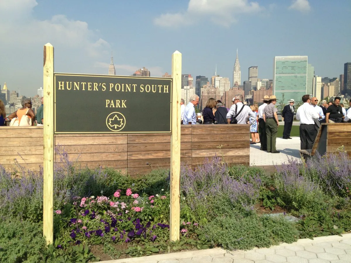 Guests attend the ribbon-cutting ceremony of Hunter's Point South Waterfront Park, Queens, New York City, August 28, 2013. Formerly an abandoned industrial area, the $66 million redevelopment in Long Island City is just phase one of what will become a 30-acre mixed-use neighborhood. (Matt Gnaizda/Epoch Times)
