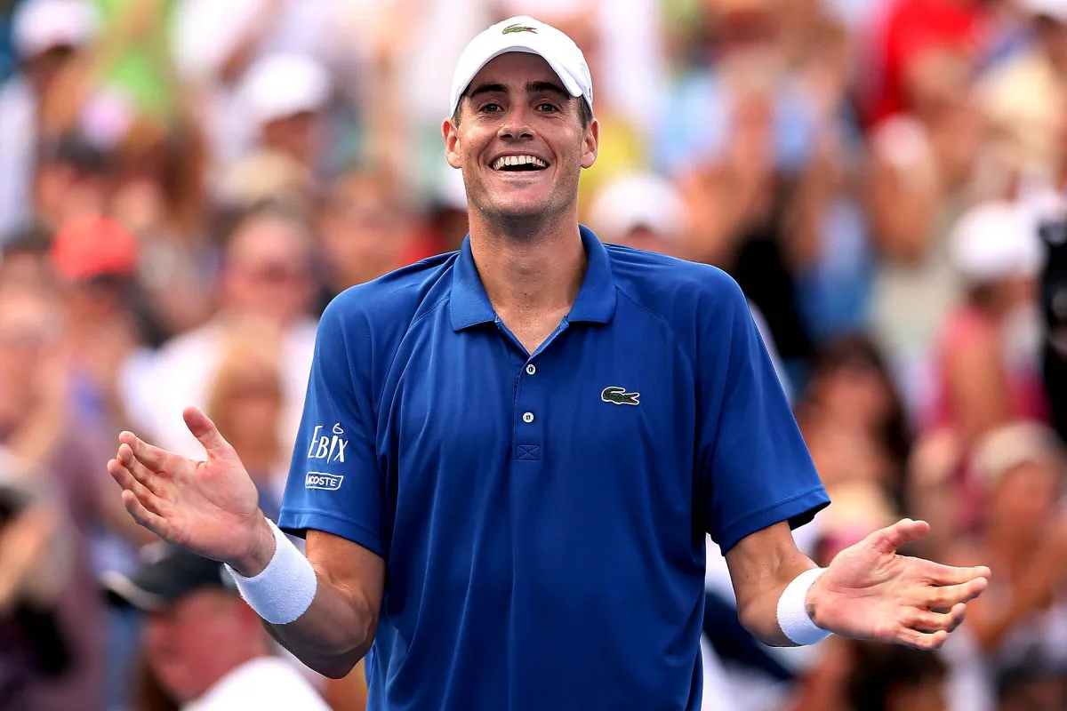 John Isner celebrates his win over Juan Martin Del Potro of Argentina during the semifinals of the Western & Southern Open on August 17, 2013 at Lindner Family Tennis Center in Cincinnati, Ohio. (Matthew Stockman/Getty Images)