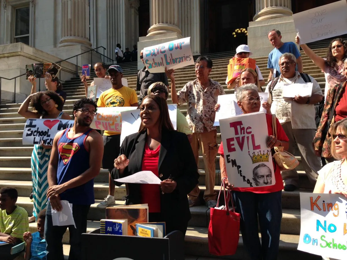 New York City Council member Letitia James speaks on the steps of the Department of Education headquarters on Aug. 21 to protest the city's request to waive a state requirement that obliges public schools to hire a librarian. (Ivan Pentchoukov/Epoch Times)
