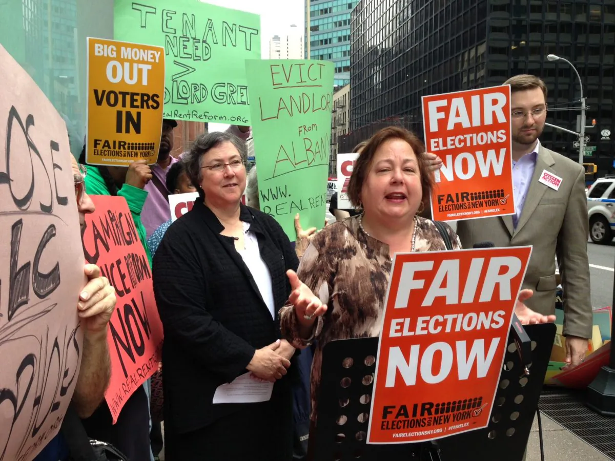 New York State Senator Liz Krueger and members of Met Council on Housing, Common Cause, and the Fair Elections Coalition on Aug. 12, 2013, at the REBNY headquarters in Midtown Manhattan. (Ivan Pentchoukov/Epoch Times)