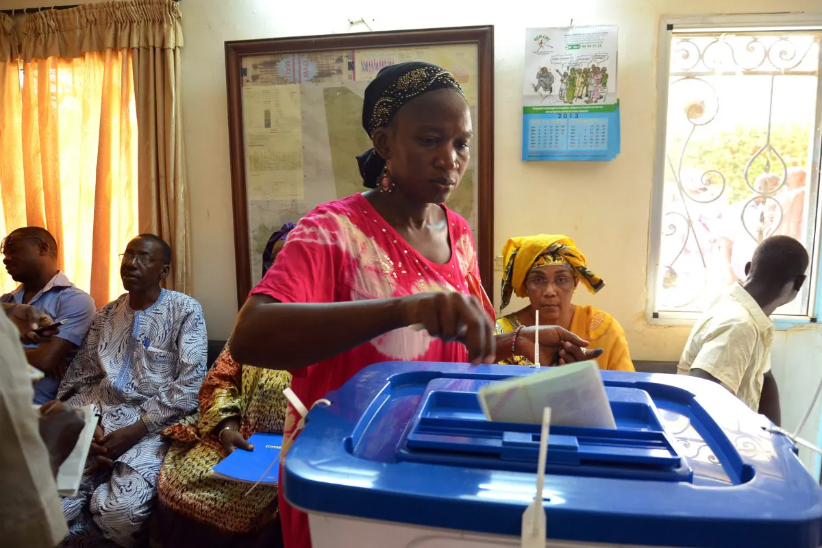 A Malian woman living in Burkina Faso casts her vote for the Malian presidential election at the Malian embassy in Burkina Faso on July 28, 2013 in Ouagadougou. (Ahmed Ouoba/AFP/Getty Images)