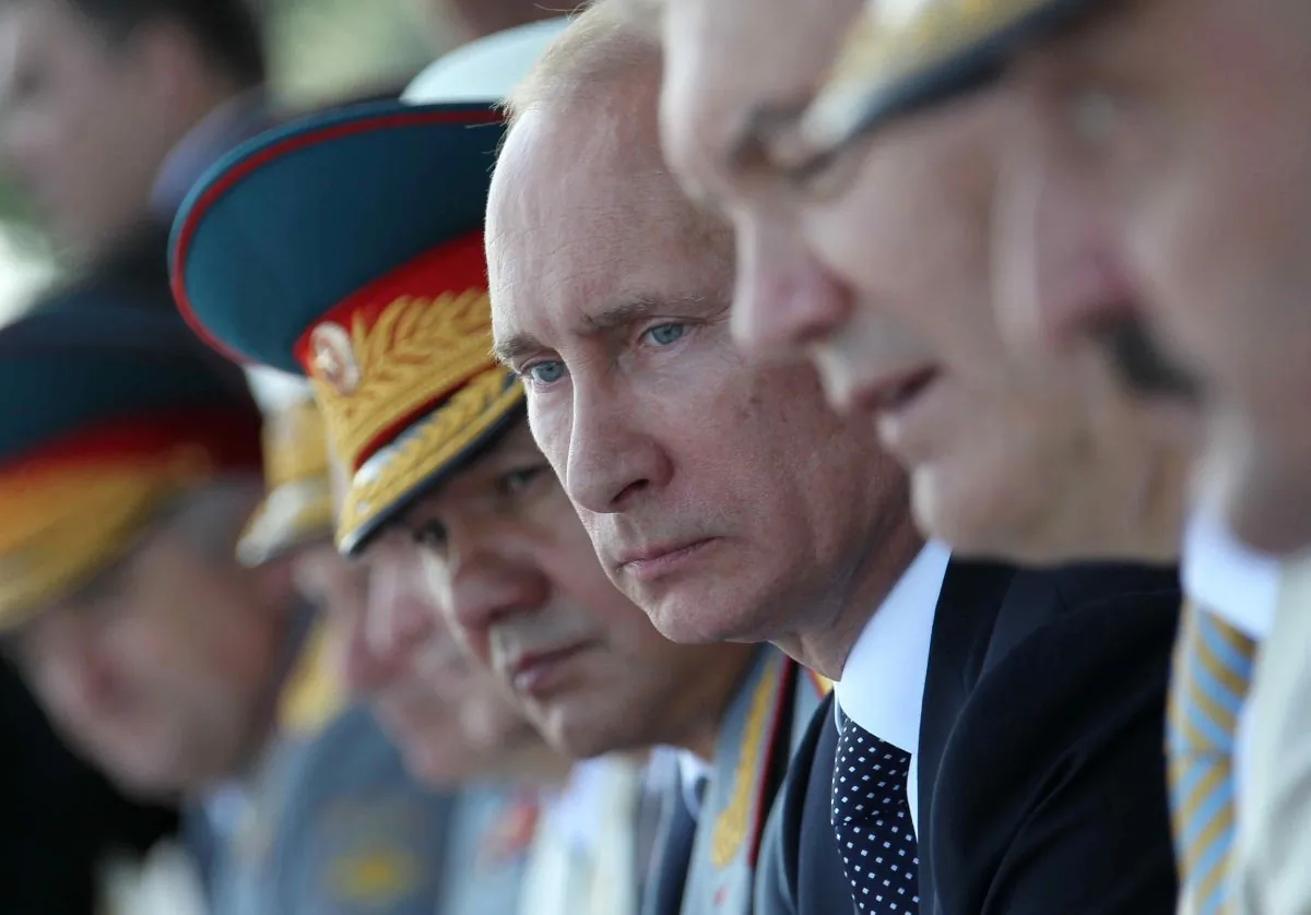 Russian President Vladimir Putin, third right, in Ukraine on July 28, 2013. (AP Photo/RIA-Novosti, Mikhail Klimentyev, Presidential Press Service)