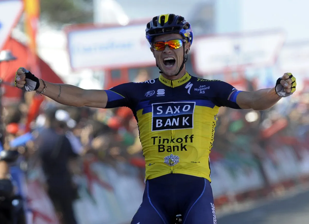 Team Saxo-Tinkoff's Nicolas Roche celebrates his victory at the end of the second day of the 68th edition of the Vuelta a España, a 177.7 km stage between Baiona and Alto do Monte da Groba, on August 25, 2013. (Miguel Riopa/AFP/Getty Images)