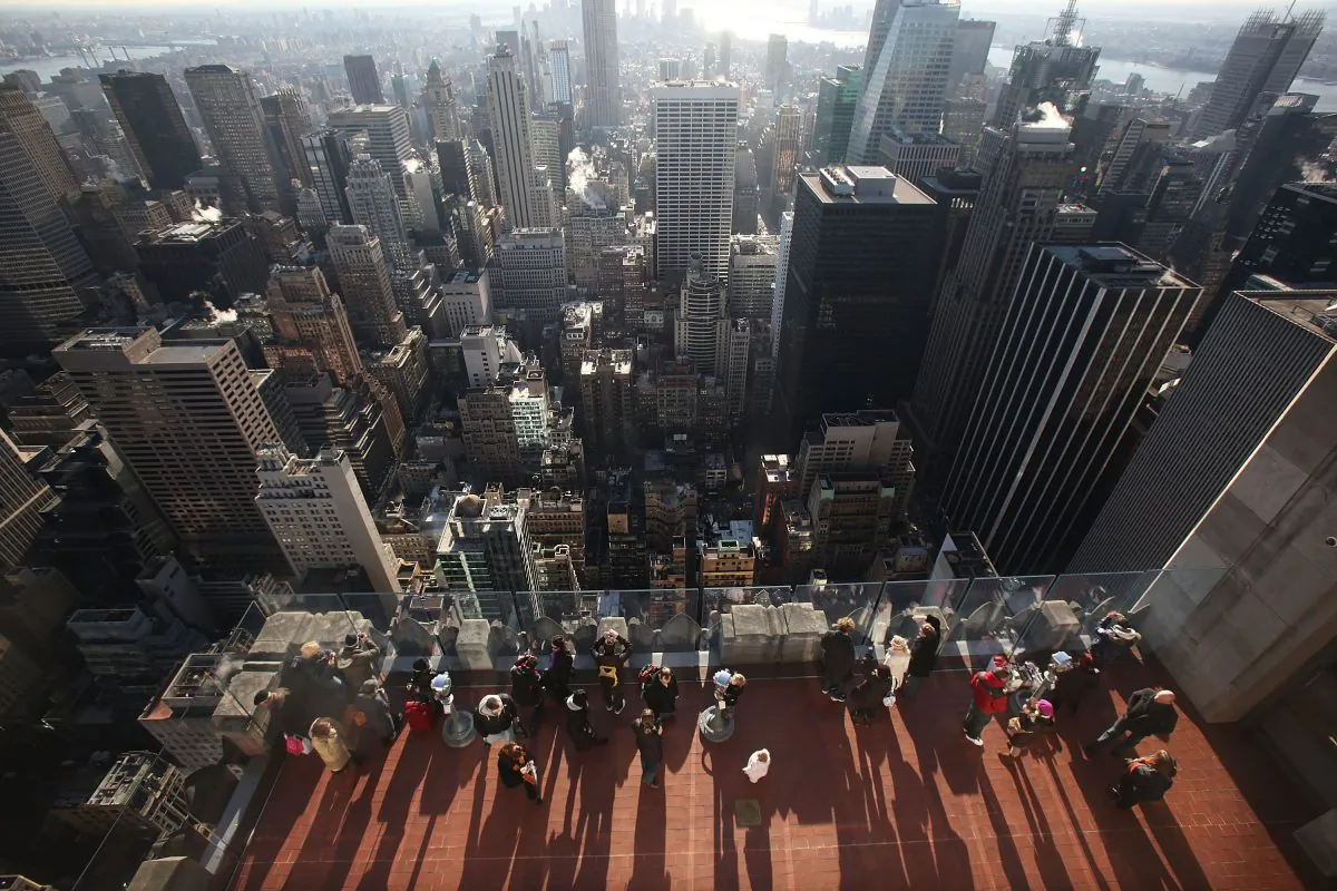  Visitors take in the view at Top of the Rock Observation Deck at 30 Rockefeller Plaza in New York City. Rockefeller Center is among New York buildings using ice to keep cool. (Mario Tama/Getty Images) 