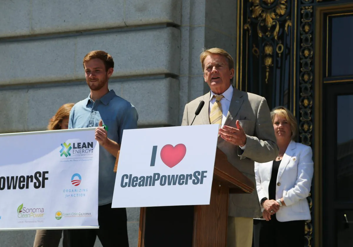 William Reilly, chairman emeritus of the Board of World Wildlife Fund, speaks at a rally in support of the CleanPowerSF program, at San Francisco City Hall, Aug. 13. (Christian Watjen/Epoch Times)