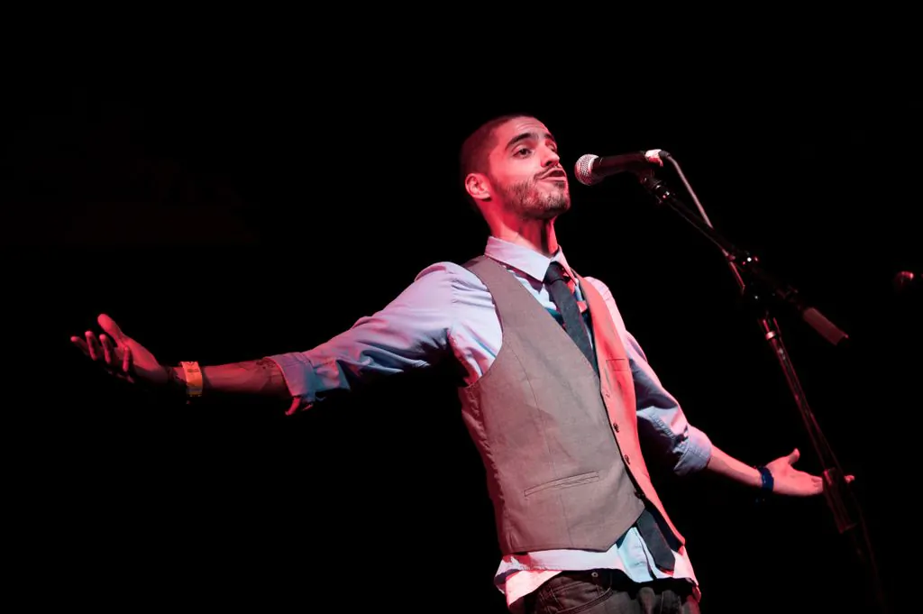 Denver, Colo. poet Shane Romero performs in a semi-final bout at the 2011 National Poetry Slam at the Middle East Upstairs in Cambridge, Mass. The Boston Poetry Slam is on until Aug. 17, 2013. (Marshall Goff/NPS)