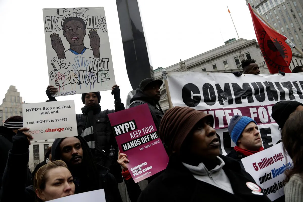 Protesters participate in a rally near the federal courthouse in New York, Monday, March 18, 2013. Many of the 5 million New Yorkers stopped, questioned and sometimes frisked by police in the past decade were wrongly targeted because of their race, lawyers for four men who said they were illegally stopped said Monday. Aug. 12, the court sided with the plaintiffs. (AP Photo/Seth Wenig)