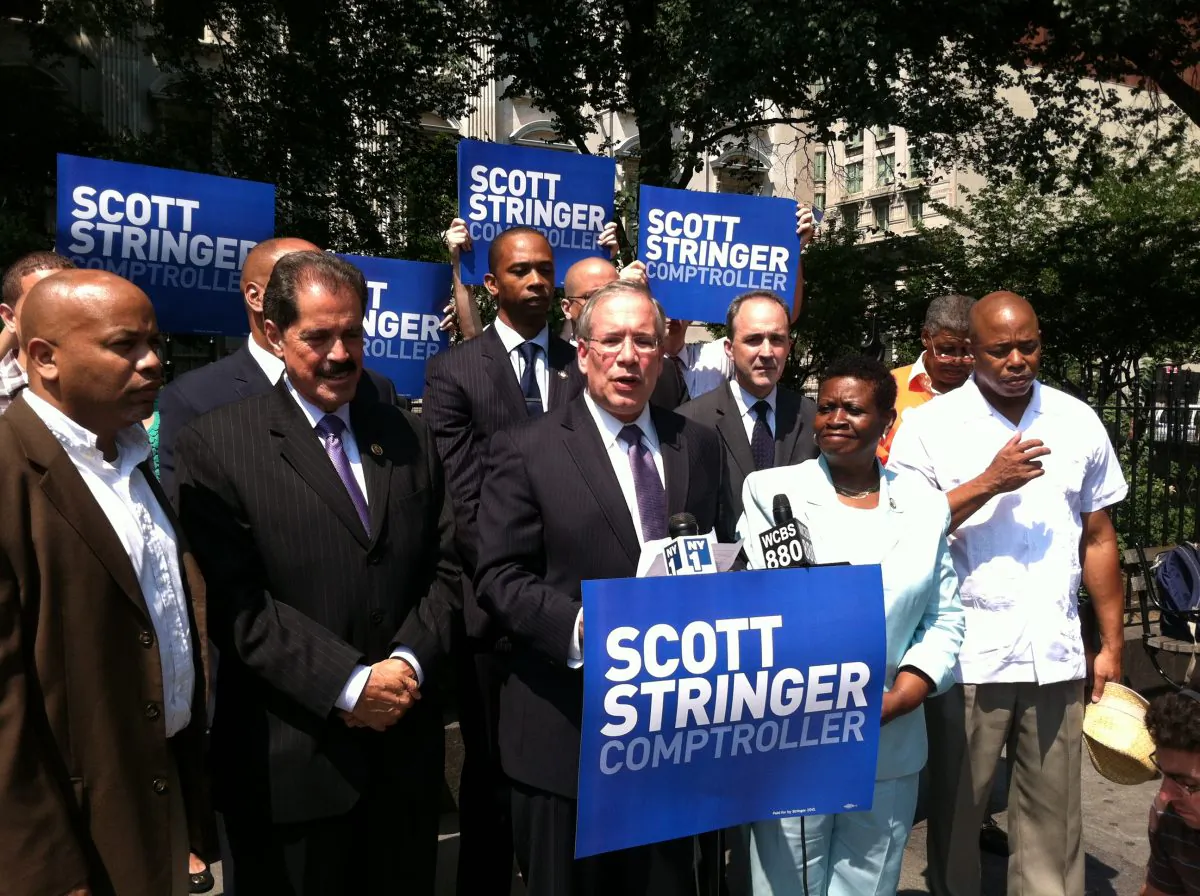 Comptroller candidate Scott Stringer, surrounded by supporters and government officials, announced a program that would help monitor claims costs against the city on Aug. 21, in New York City. (Kristen Meriwether/Epoch Times)