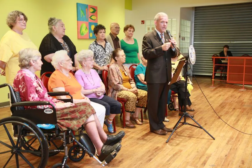 Council member Jimmy Van Bramer announces his allocation of $2.6 million to senior services at the Sunnyside Community Services center on Aug. 30, 2013. (Kristina Skorbach/Epoch Times)