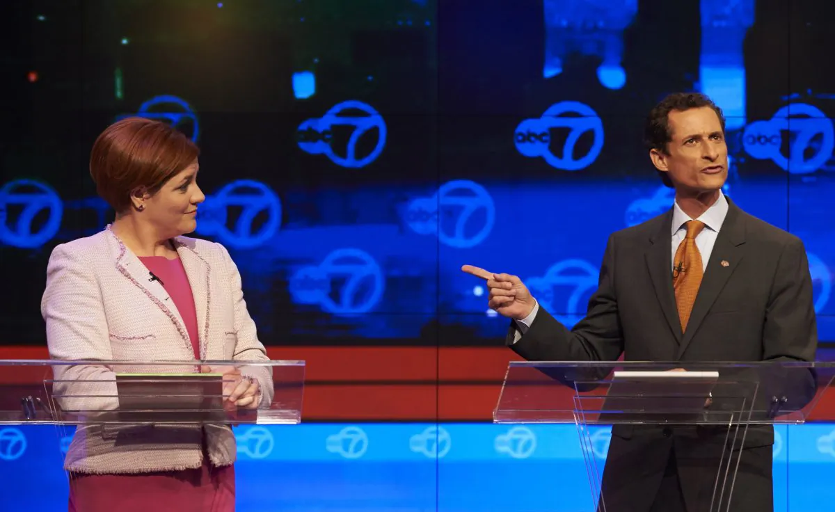 New York City Democratic mayoral candidates Christine Quinn, (L), listens as fellow candidate Anthony Weiner speaks during their first primary debate for New York City mayor at the WABC/Channel 7 studios, Tuesday, Aug. 12, 2013 in New York. (AP Photo/New York Daily News, James Keivom)