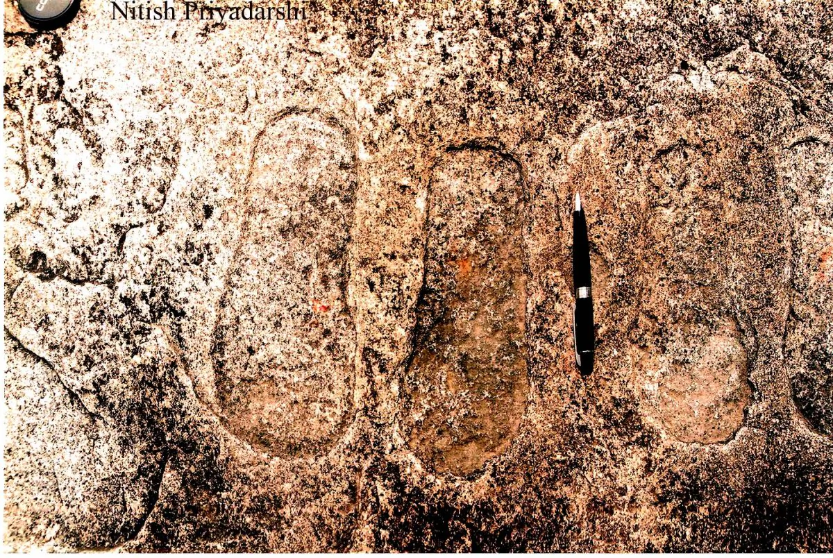 Footprints on a rock in Piska Nagri village, on the outskirts of Ranchi City in Jharkahnd State, India. Probably thousands of years old, these footprints are engraved on granite rock by the earlier inhabitants of the area and are believed by the locals to be those of king gods Rama and Lakshmana. (NITISH PRIYADARSHI)