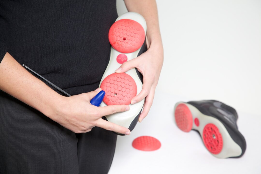 Patients report reduced knee and back pain from wearing the personally adjusted footwear device whilst performing their daily routine tasks. (Courtesy of AposTherapy.co.uk)
