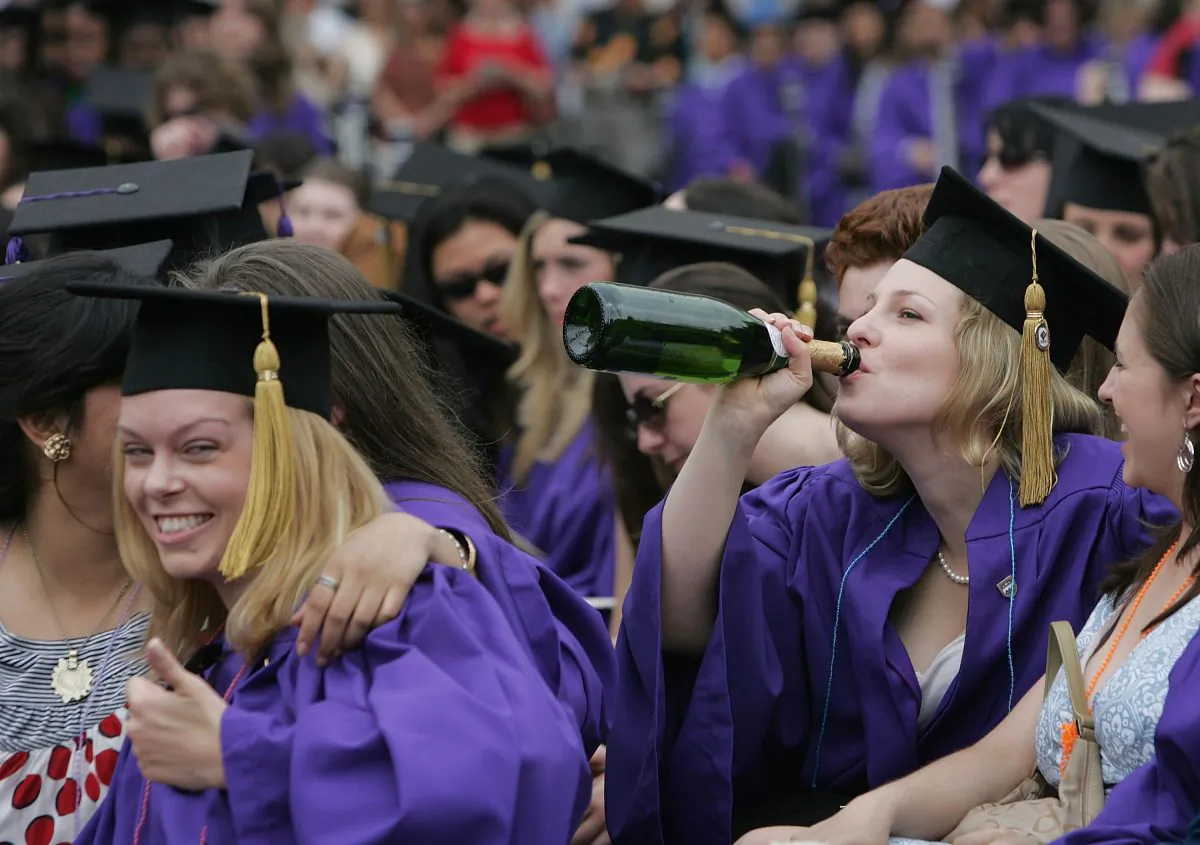 A file photo of New York University College of Arts and Science graduates celebrating at a graduation ceremony in Washington Square Park. (Mario Tama/Getty Images)