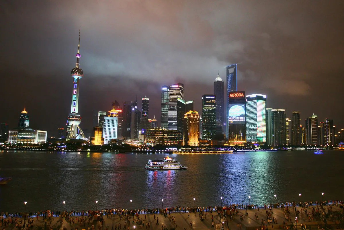 A sightseeing ship on the Huangpu River against the night skyline of Pudongs Lujiazui Financial District in Shanghai, China on July 15, 2011. (Feng Li/Getty Images)