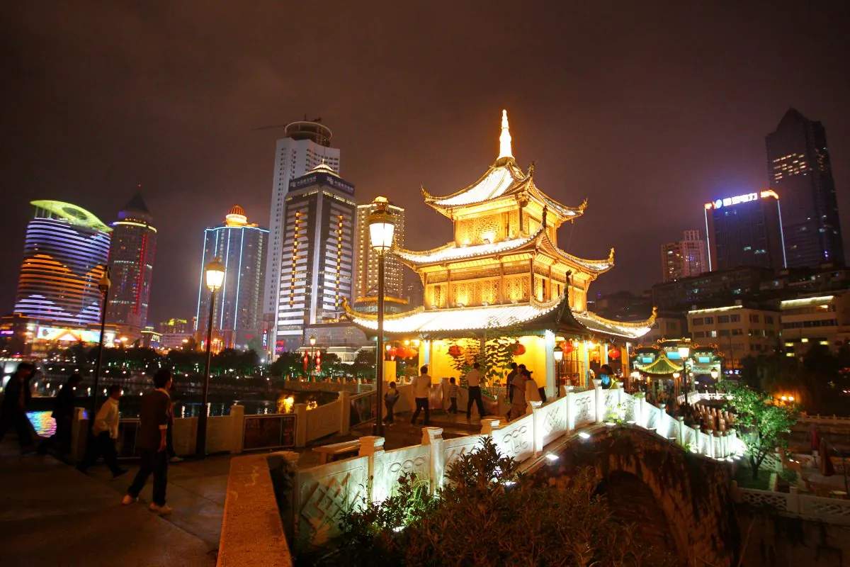 The night scene of an array of edifices and the Jiaxiulou Tower, the city's landmark ancient building for sightseeing, in Guiyang city of Guizhou Province, China, on Sept. 9, 2011. (Feng Li/Getty Images)