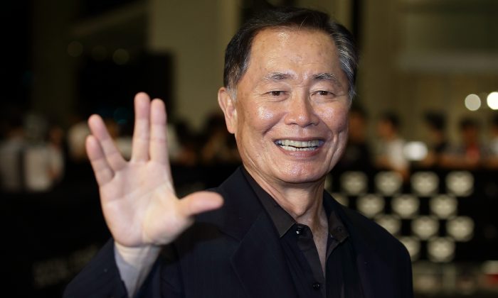 American actor and author, George Hosato Takei gives the "Vulcan salute" during the Social Star Awards 2013 at Marina Bay Sands on May 23, 2013 in Singapore. (Suhaimi Abdullah/Getty Images)