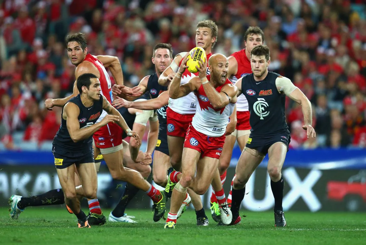 Injured but still best on ground ... Jarrad McVeigh of the Sydney Swans looks upfield during the AFL First Semi-final against the Carlton Blues on Saturday night Sept 14, 2013. McVeigh entered the game under an injury cloud, but managed to collect a career high 42 possessions, while laying five tackles, taking nine marks and kicking two goals in a dominant display. (Ryan Pierse/Getty Images)
