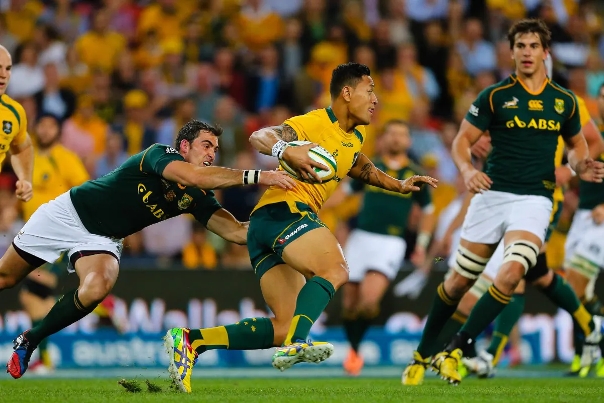 When last they met ... Australian Wallaby fullback Israel Folau is tackled by South African Springbok scrum half Francois Louw during their Rugby Championship match at Suncorp Stadium in Brisbane on September 7, 2013. The ’Boks won 12-38 and will be looking to win again when they meet on Saturday night in South Africa. (PATRICK HAMILTON/AFP/Getty Images)