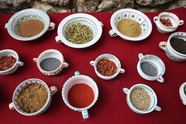 Spices used for cooking, including chili peppers, cardamon seeds, cinnamon, paprika, poppy seed and black pepper, lie arranged on a table on July 5, 2013 in Monteriggioni, Italy. Richard Anderson, of the U.S. Department of Agriculture, said that small amounts of cinnamon help to decrease blood sugar in diabetes patients. (Sean Gallup/Getty Images)