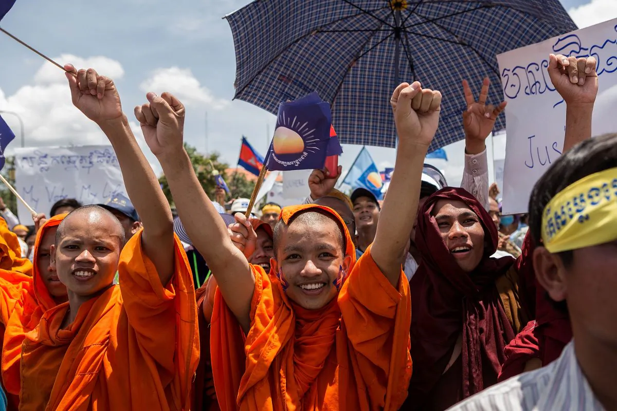 Supporters of the Cambodia National Rescue Party show their support in Freedom Park, Sept. 7 in Phnom Penh, Cambodia. Thousands rallied to challenge Prime Minister Hun Sen’s disputed election win.
(Nicolas Axelrod/Getty Images)