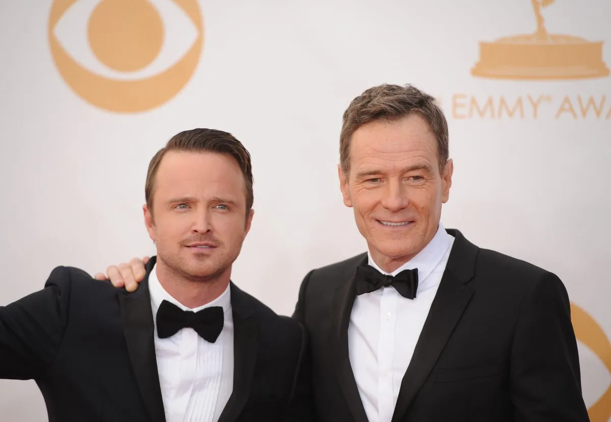 Breaking Bad actors Bryan Cranston (R) and Aaron Paul (L) arrive on the red carpet for the 65th Emmy Awards in Los Angeles, California, on September 22, 2013. (Robyn Beck/AFP/Getty Images)