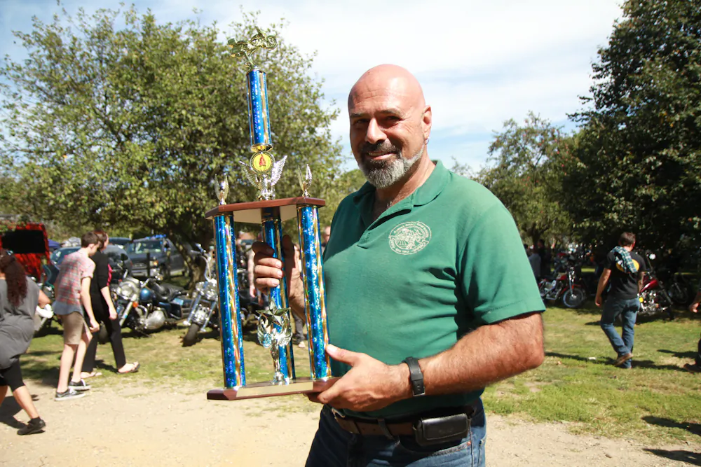 Steve Eftimiades, the organizer of the 32nd Annual Antique Motorcycle Show at the Queens Farm Park, N.Y., Sept. 15, 2013. (Colin Fredericson/Epoch Times) 