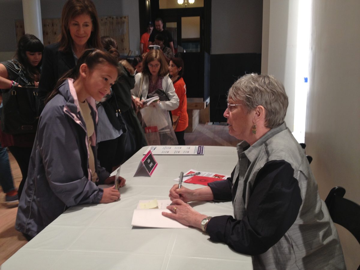 Established author, Lois Lowry, signs books for her fans at the Brooklyn Historical Society building in Brooklyn, New York City, Sept. 22, 2013. Lowry was honored at the Brooklyn Book Festival as the recipient of the Best of Brooklyn Inc. award. (Kristina Skorbach/Epoch Times Staff)