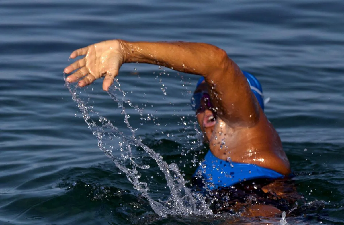 FILE - In a Saturday, Aug. 31, 2013 file photo, U.S. endurance swimmer Diana Nyad, 64, begins her swim to Florida from the waters off Havana, Cuba. Nyad's representatives said Monday, Sept. 2, 2013 that she's less than 10 miles (16 kilometers) from Florida in her latest attempt to swim there from Cuba. Nyad is trying to become the first person to swim from Cuba to Florida without a shark cage. (AP Photo/Ramon Espinosa, File)