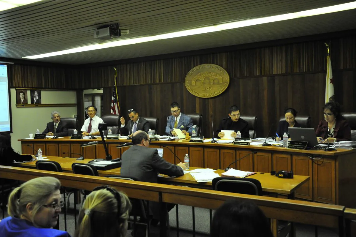 Hacienda La Puente School Board (L-R) Rudy Charria, member; Dr. Joseph Chang, member; Anthony Duarte, clerk; Gino Kwok, vice president; Jay Chen, president; Cynthia Purulan, interim superintendent. Dr. Chang is alleged to have a conflict of interest with a Chinese company that supplied students for the school district’s foreign student program. (Robin Kemker/The Epoch Times)