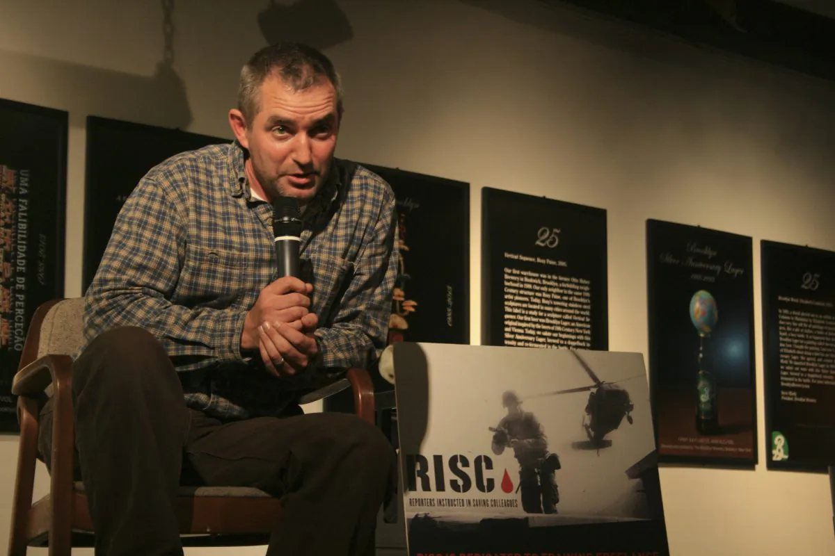 C.J. Chivers talks to the audience at the War Correspondents at Brooklyn Brewery series, New York City, Sept. 11, 2013. (Genevieve Belmaker/Epoch Times)
