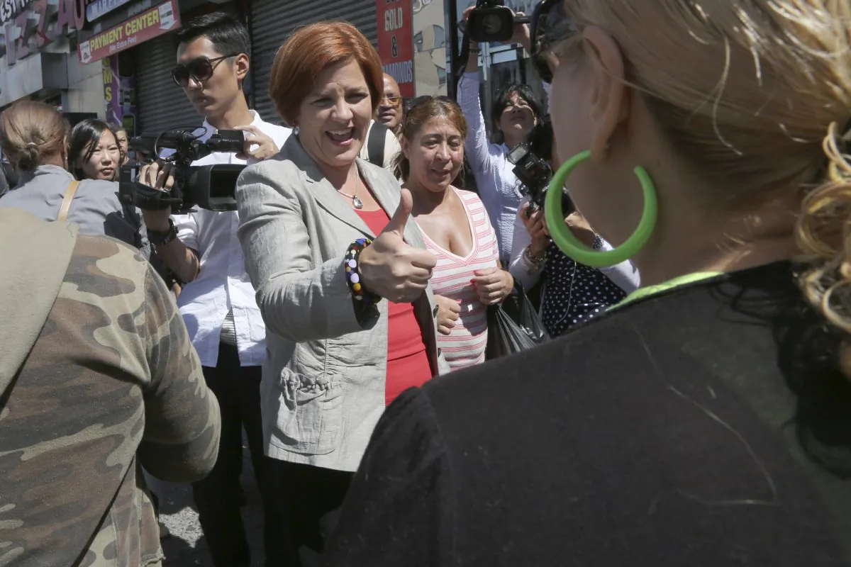 New York City Democratic mayoral hopeful and City Council Speaker Christine Quinn gives a woman a thumbs up during a campaign stop in the Bronx borough of New York, Sept. 5, 2013. (Mary Altaffer/AP Photo)