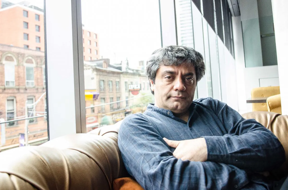 Iranian director Mohammad Rasoulof struggled with inner conflict while making his latest film "Manuscripts Don't Burn," which deals with oppression and real-life assassinations of political dissidents in Iran. The director faces a one-year jail sentence for a previous film with similar subject matter. (Matthew Little/Epoch Times)
