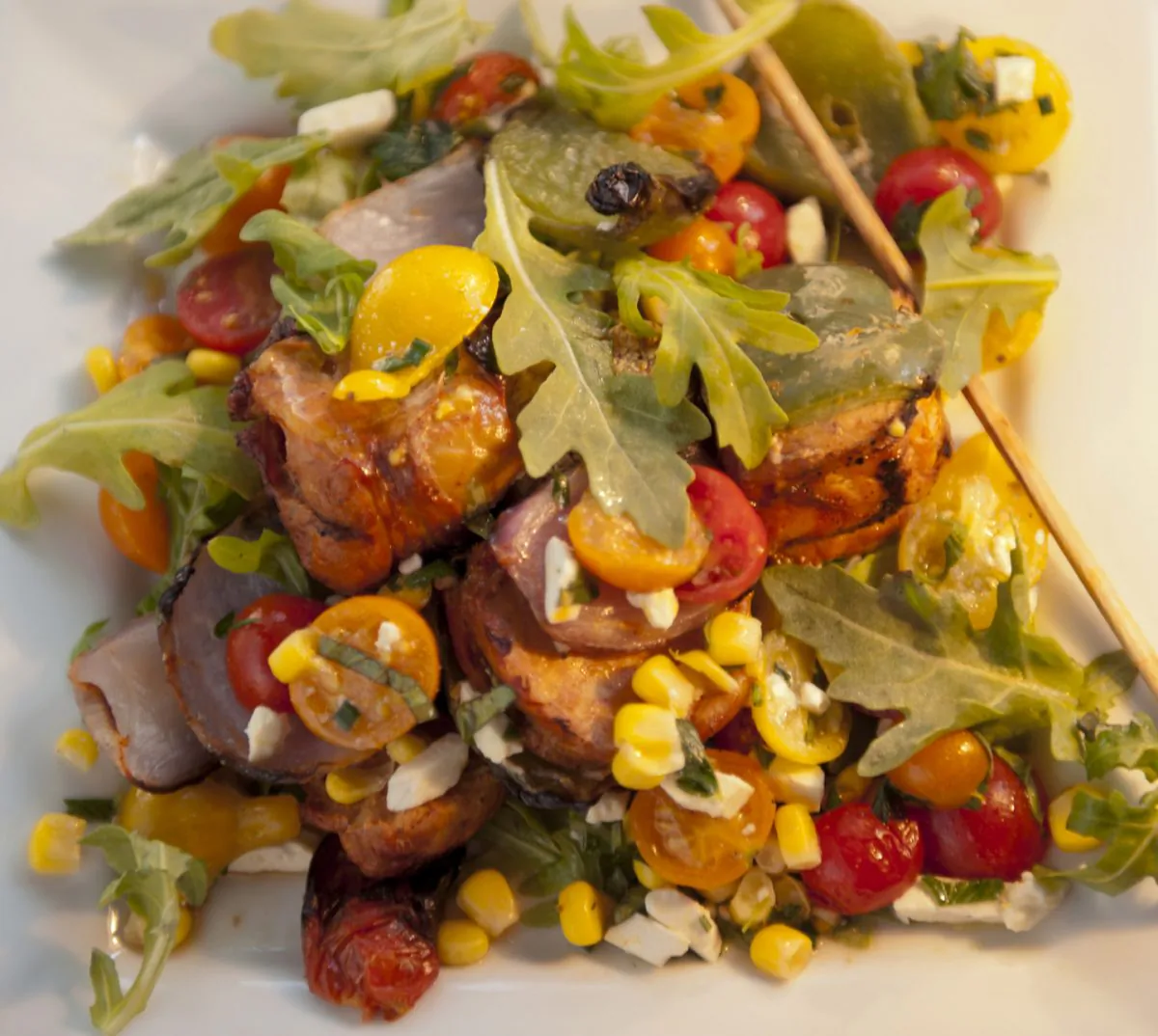 Herb Cherry Tomato Salad with kebab. (Cat Rooney/Epoch Times)