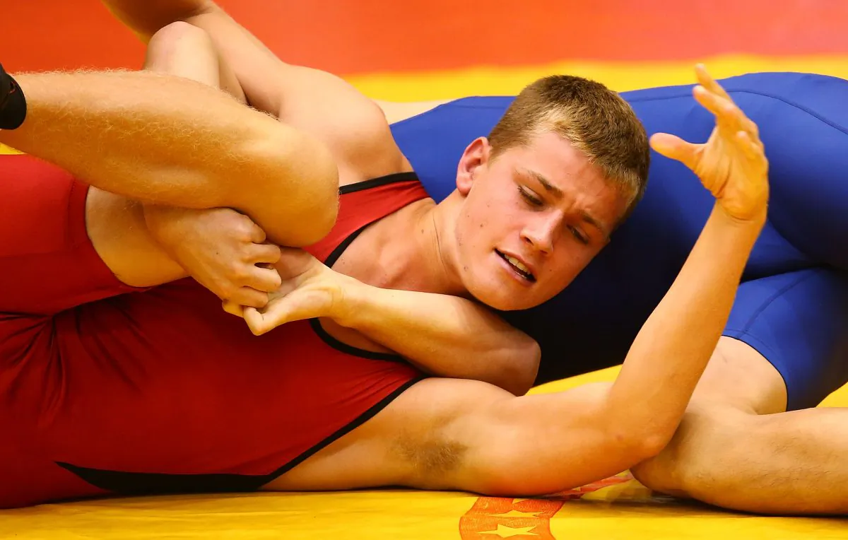 Sean O'Dea of Australia (red) competes against Jiuzhen Yao of China in wrestling on day five of the Australian Youth Olympic Festival at Sydney Olympic Park Sports Halls in Sydney, Australia, on Jan. 20, 2013. (Mark Nolan/Getty Images)