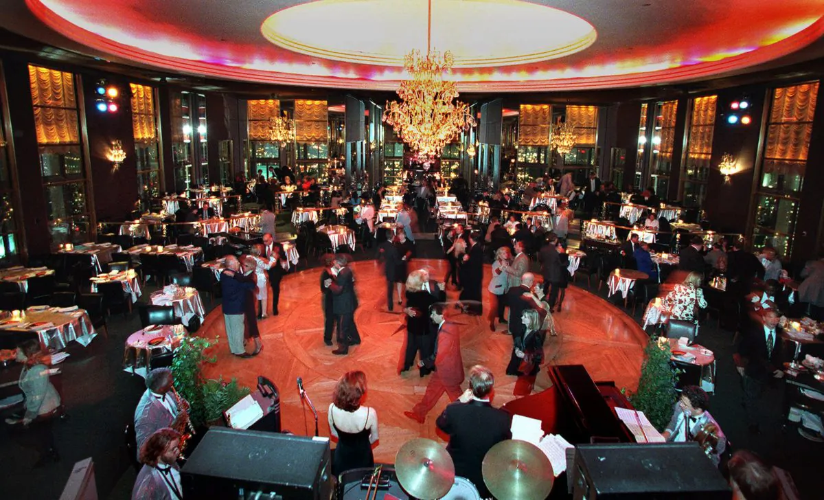 Guests at the Rainbow Room dance on the revolving floor of the restaurant and nightclub, Dec. 17, 1998. The iconic club at Rockefeller Center will reopen in the fall of 2014. (AP Photo/Suzanne Plunkett, File)
