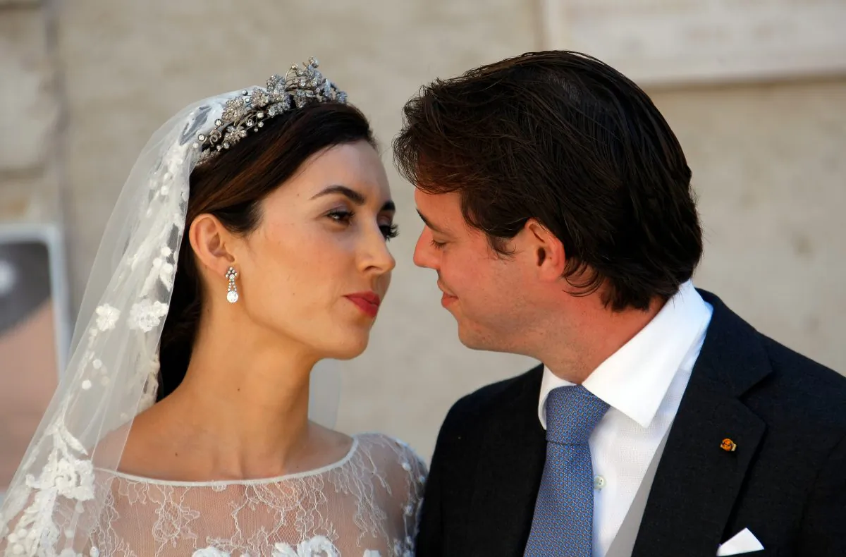 Prince Felix of Luxembourg and his wife Claire Lademacher after their church wedding in Saint-Maximin-La-Sainte-Baume, southern France, Saturday, Sept. 21, 2013. (AP Photo/Claude Paris)