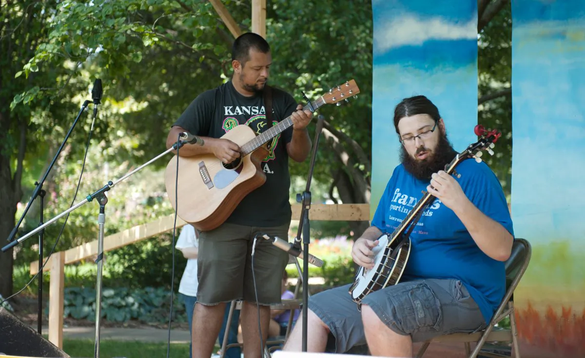 Second banjo competitor in the banjo category of the 33rd State Fiddling and Picking Championships, Lawrence, Kan., on Aug. 25, 2013. (Cat Rooney/Epoch Times)