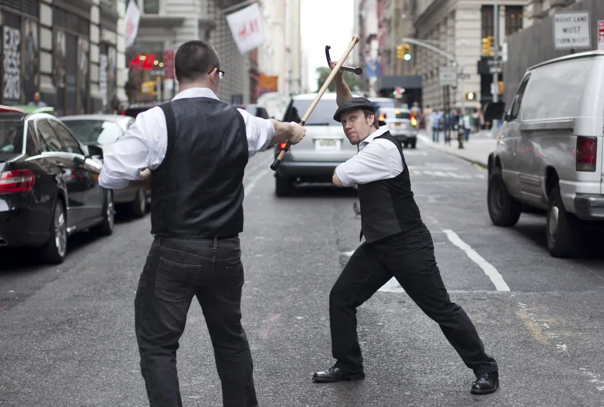 (L) Brad Gibson (R) Jesse Barnick combating in Bartitsu on 18th Street, New York City, Aug. 18. (Samira Bouaou/Epoch Times)