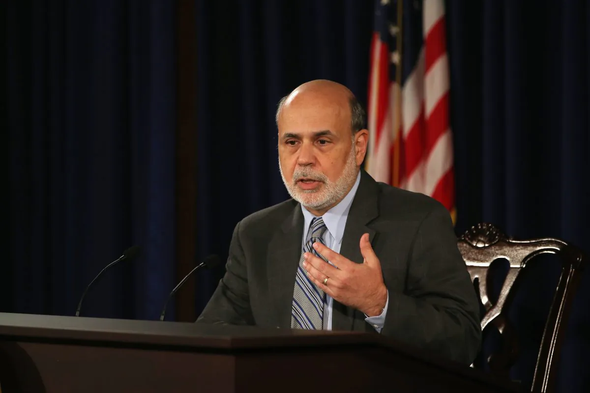 Chairman of the U.S. Federal Reserve Ben Bernanke speaks during a news conference in Washington, D.C., on Sept. 18, 2013. The Fed cut its U.S. economic growth forecasts for this year and 2014 as it unexpectedly left its asset purchase program unchanged. (Jim Watson/AFP/Getty Images)
