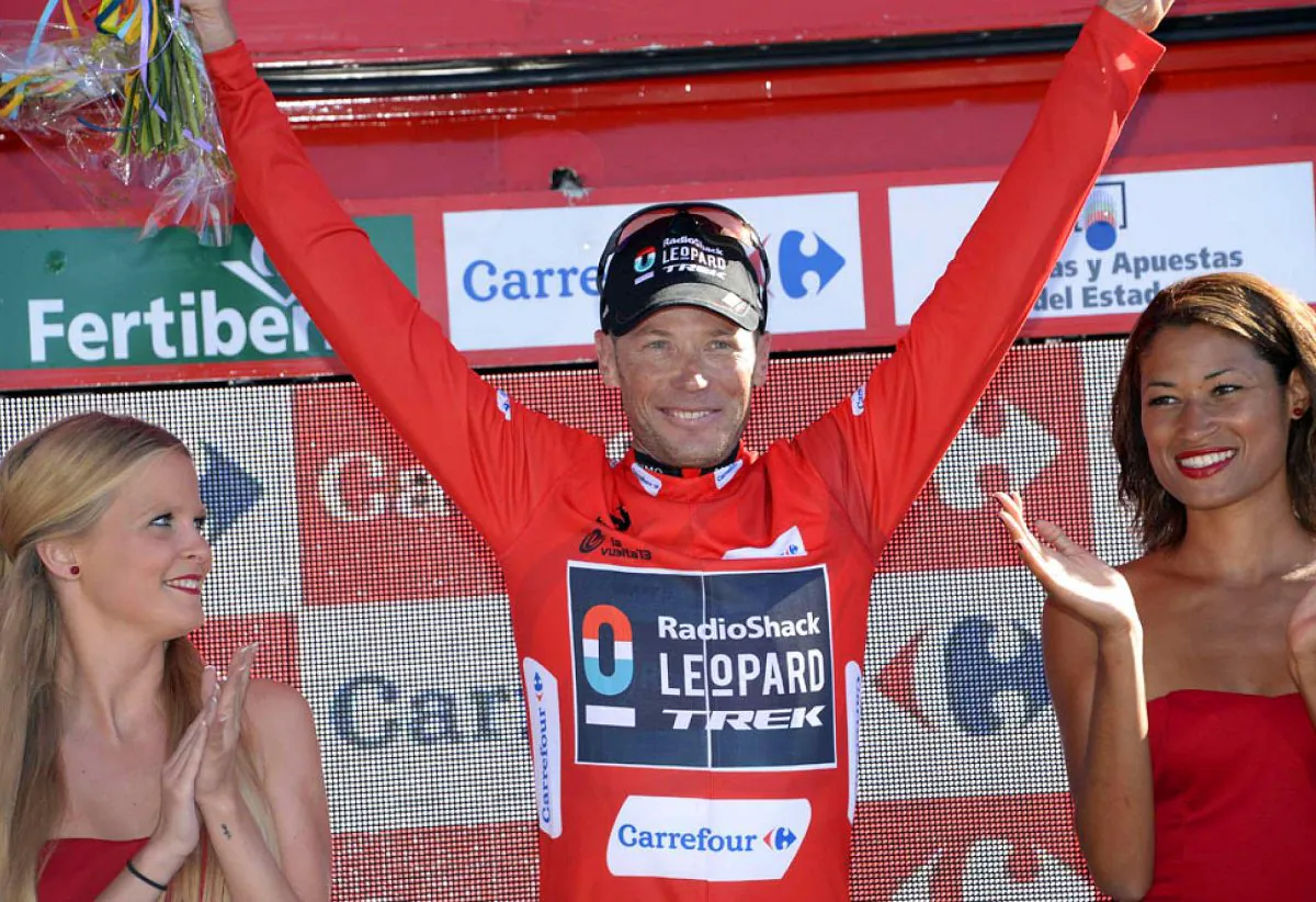 Chris Horner of RadioShack Leopard-Trek exults in the race leader’s red jersey after winning it for the third time in Stage 19 of the 2013 Vuelta a España. (radioshackleopardtrek.com)