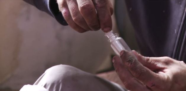 A Russian man prepares the Kokodil drug, or Desomorphine, for injection. (Screenshot/Vice)