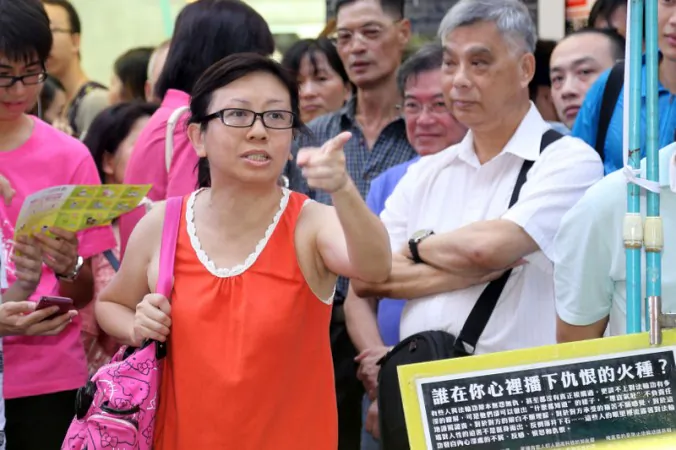 A July 14, 2013 photo of Lam Wai Sze, a Hong Kong female teacher who spoke in defense of Falun Gong. She recently received a death threat in a letter written by someone who identified themselves as an "underground Communist Party member." (Pan Zai Shu/Epoch Times)