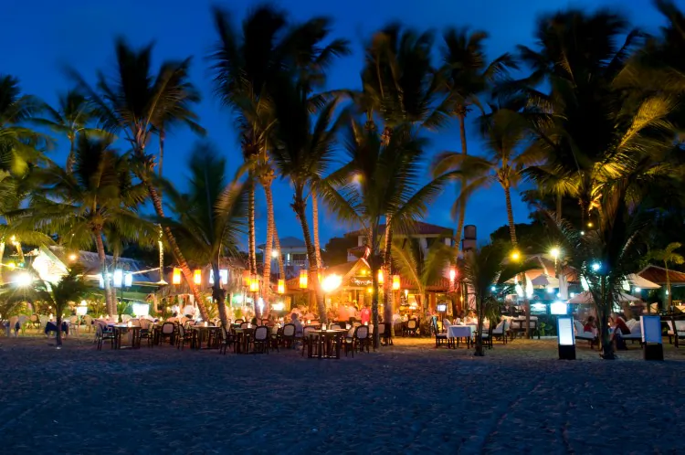 Outdoor bars and restaurants line the beach and make for a festive nightlife scene in Cabarete, Dominican Republic. (Courtesy of Dominican Republic Ministry of Tourism)