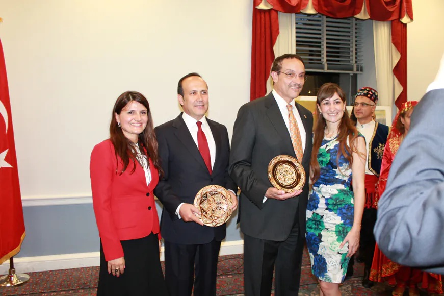 DC Mayor Vincent Gray and Namik Tan, Ambassador of Turkey, pose for a photograph with Demet Cabbar (left) and Salcigil White who are with the American Turkish Association of Washington, D.C. at the opening reception for Turkish Cultural Heritage Month on Capitol Hill Sept. 9 (Tiffany Wu/ Epoch Times)