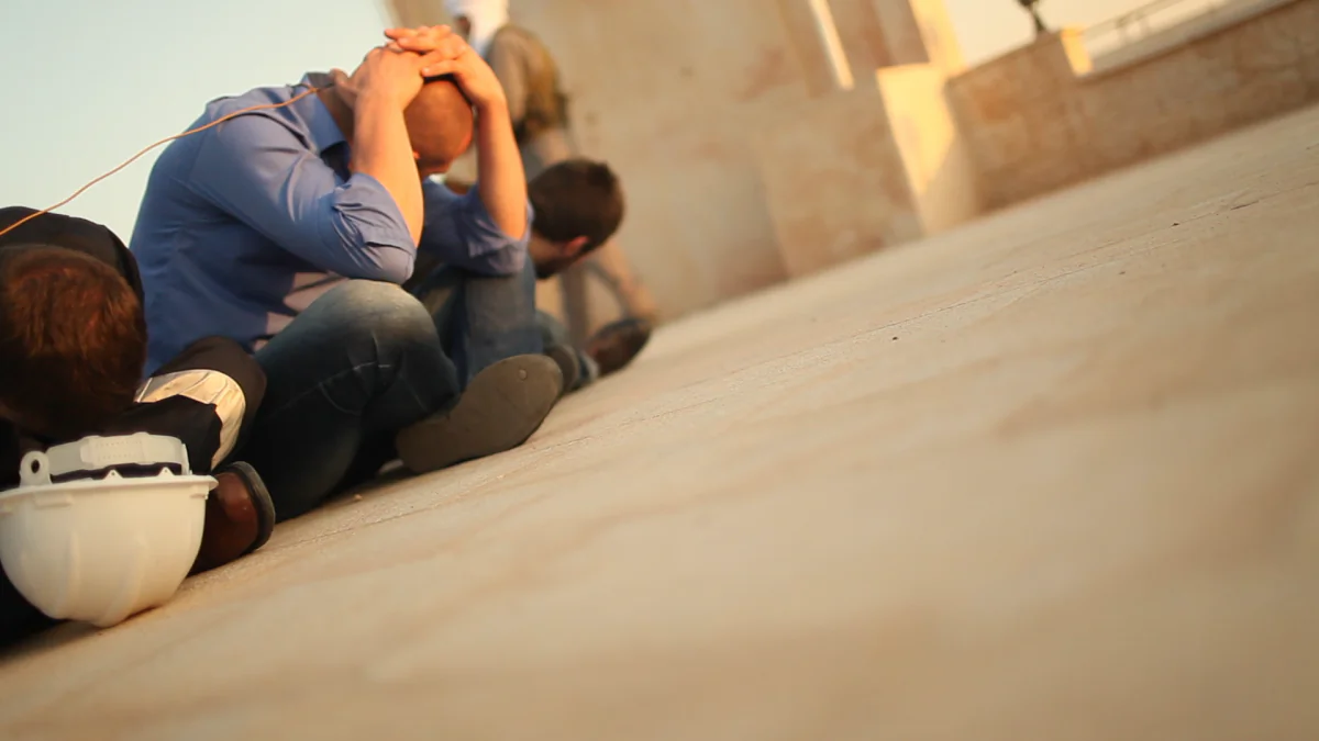 The hostages are tied together by detonation wire in this scene fro the PBS documentary Held Hostage. (PBS)